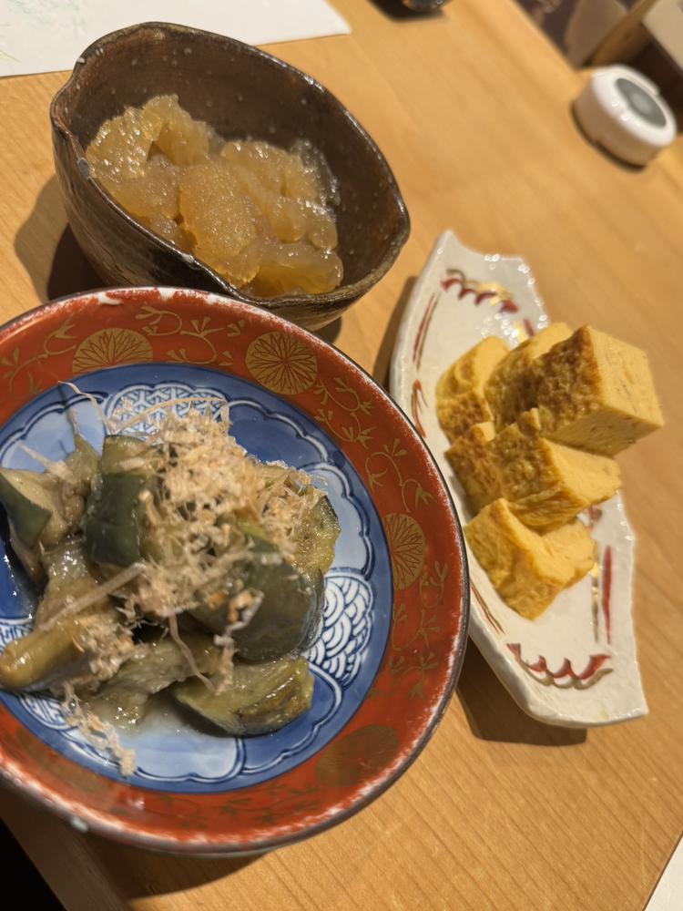 ま